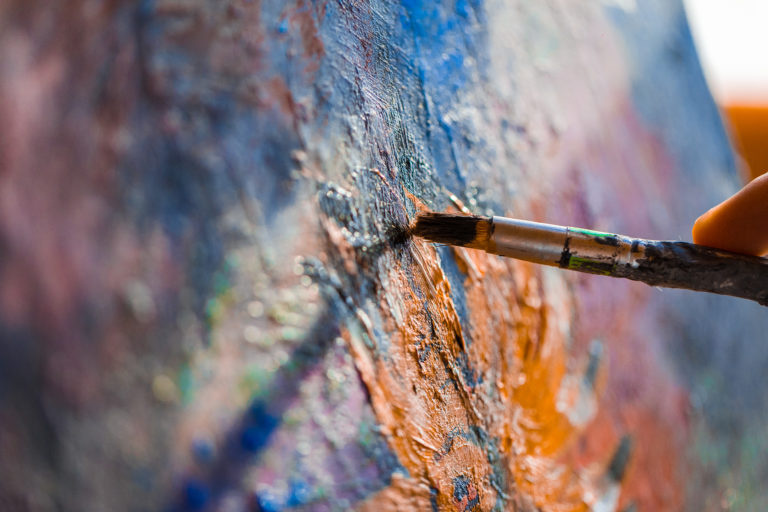 Painting on the canvas with acrylic